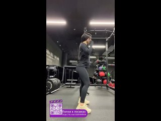 brunette in leggings is training in the gym